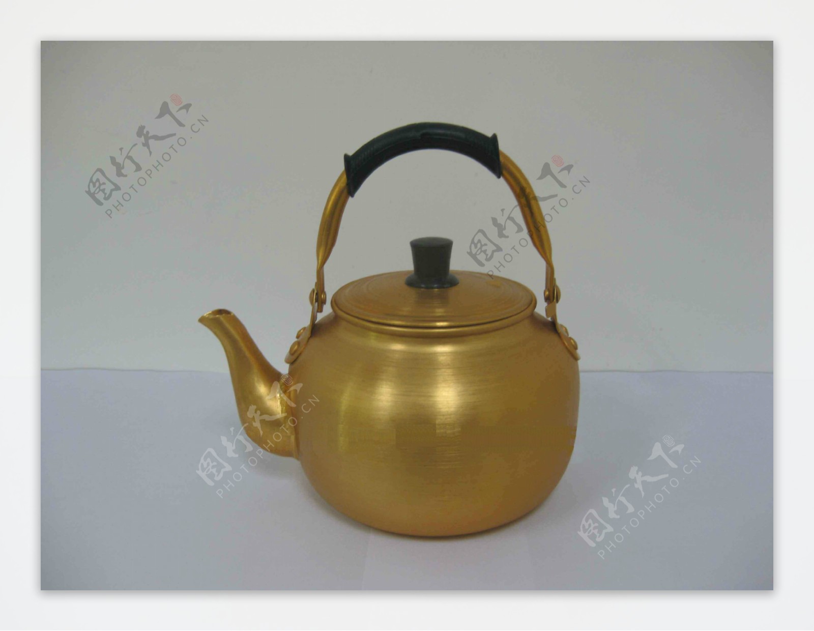 黄铜手提茶壶图片