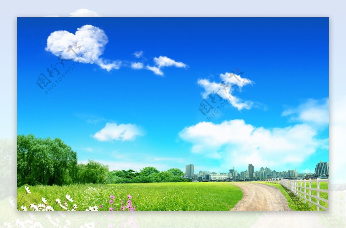 蓝天白云绿草地背景图片