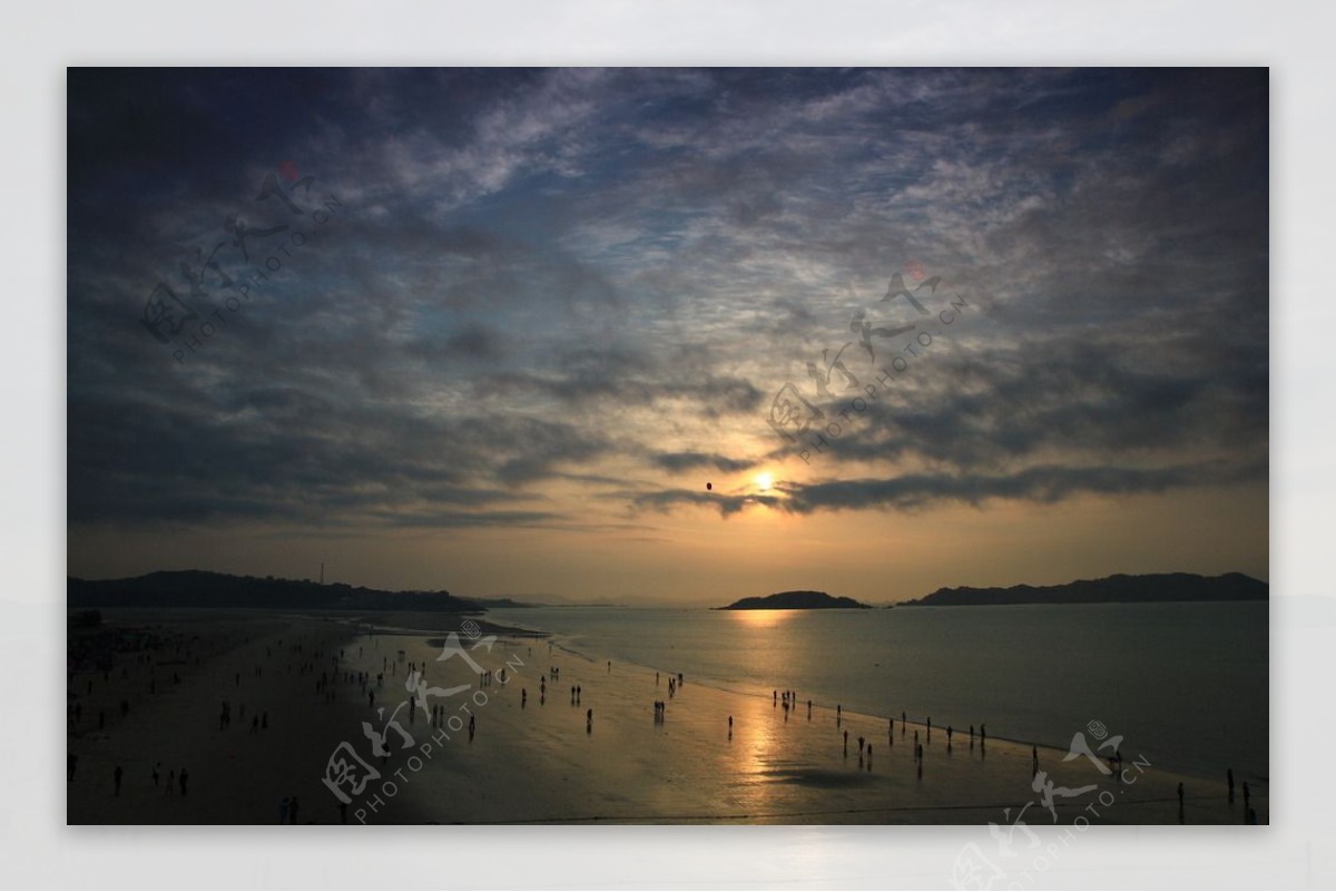 日出日落海岸线沙滩图片