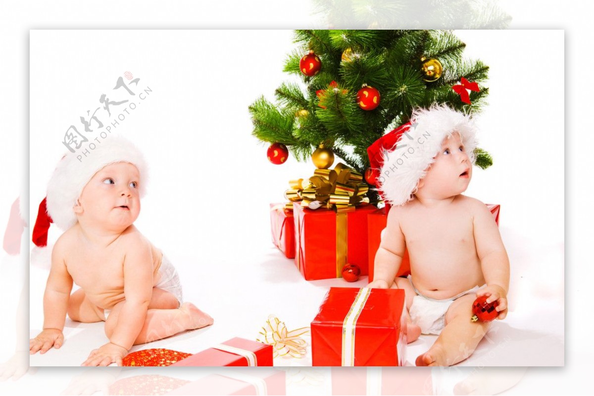带圣诞帽的可爱圣诞婴儿宝宝图片