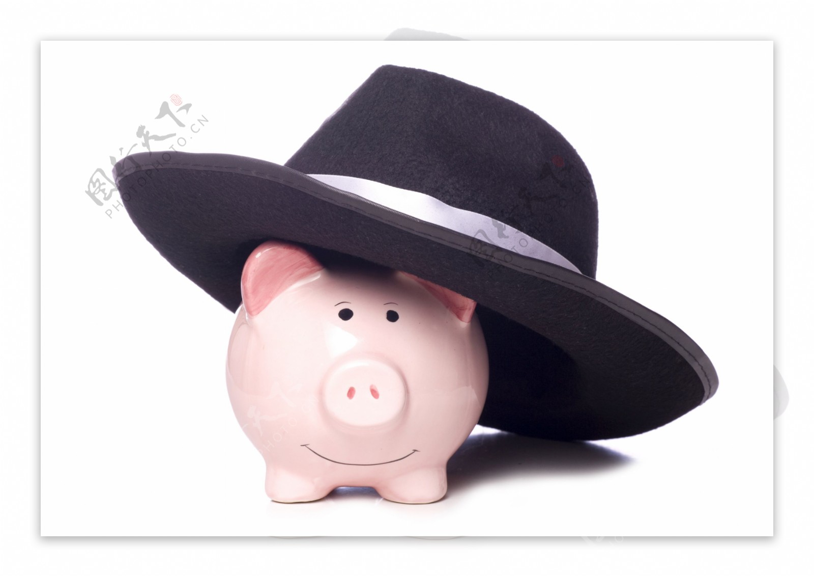 礼帽下的小猪储钱罐图片