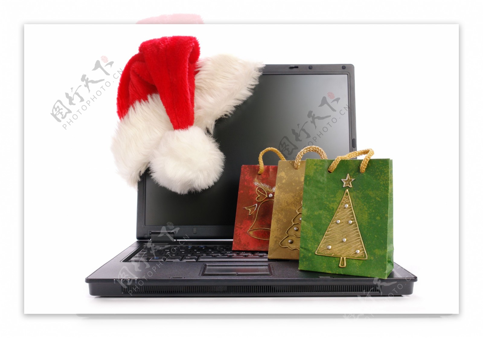 圣诞购物袋与电脑图片