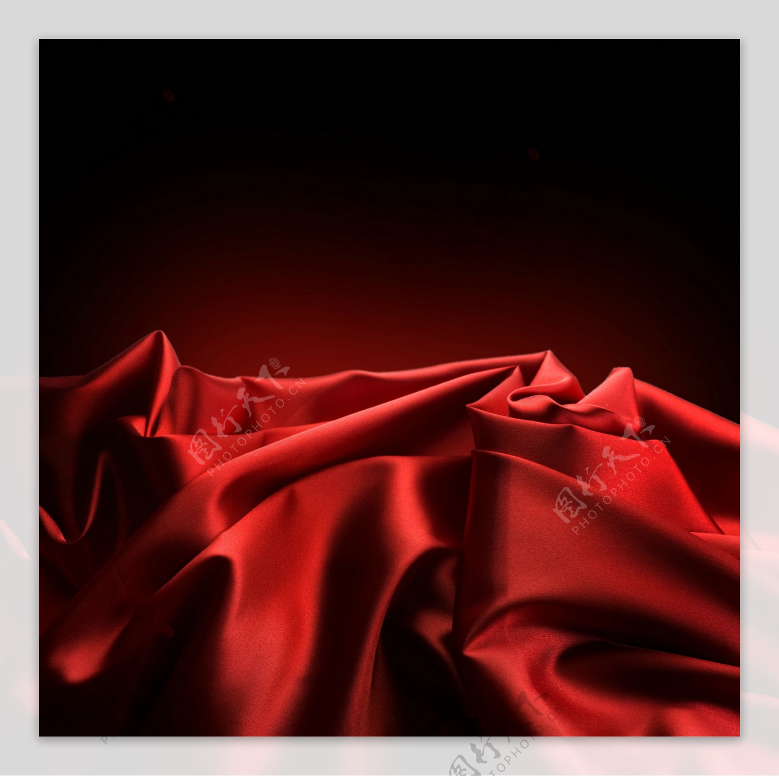 红色丝绸褶皱背景图片