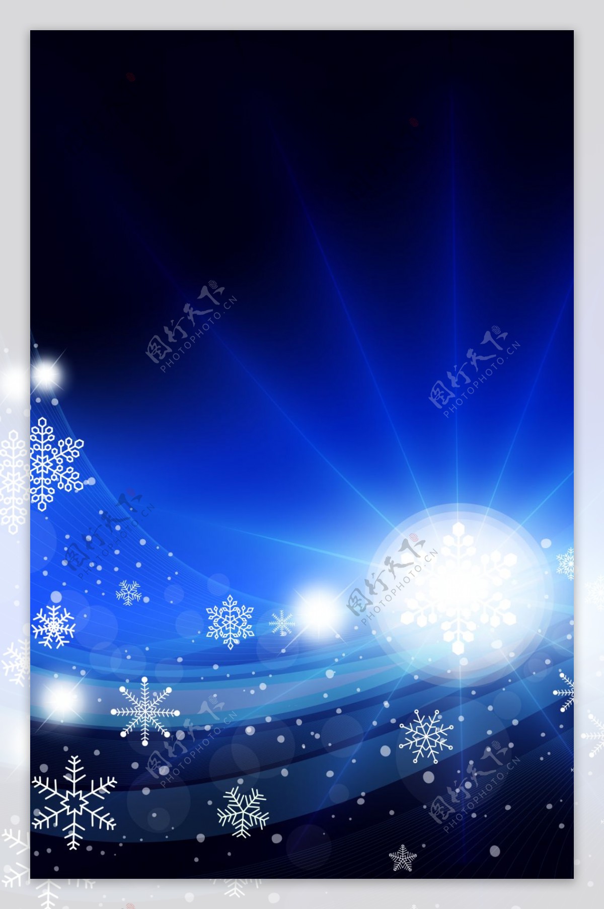 蓝色光束上的雪花背景素材