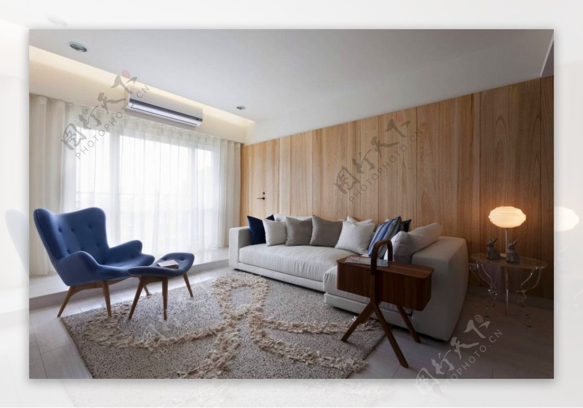 简约客厅沙发木质背景装修效果图